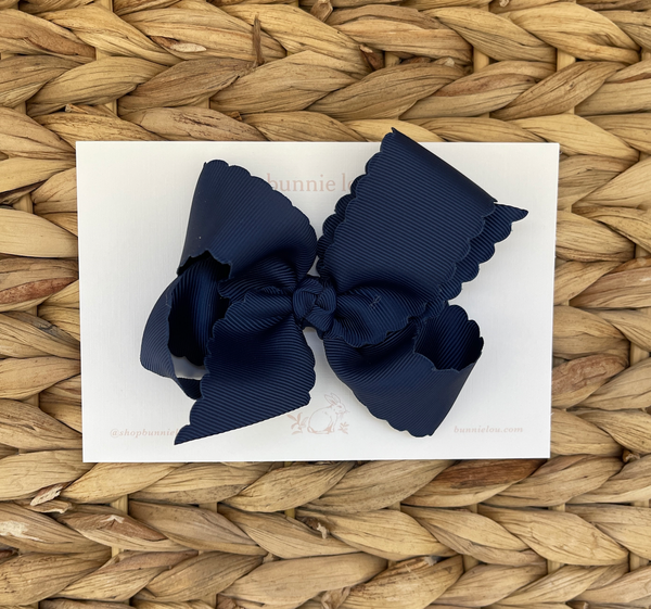 navy scallop edge bow