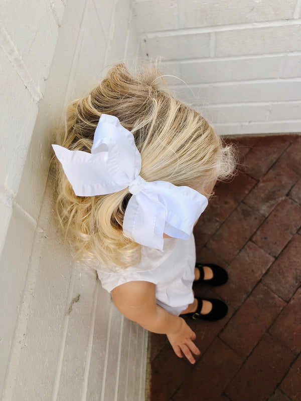 classic white ruffle edge bow