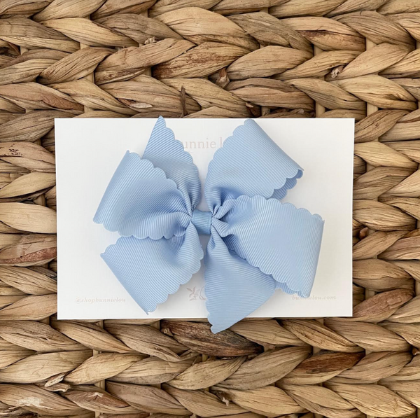 carolina blue scallop edge bow