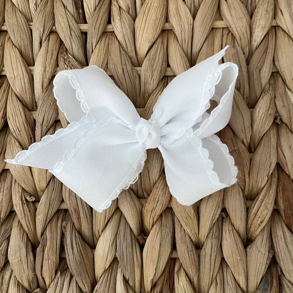 classic white scallop edge bow